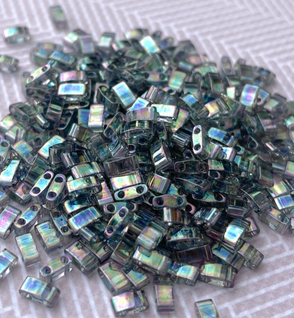 Dark Transparent Grey Rainbow Luster Miyuki Half Tila Beads - 8 grams