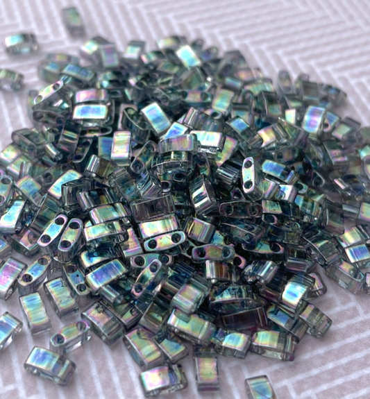 Dark Transparent Grey Rainbow Luster Miyuki Half Tila Beads - 8 grams