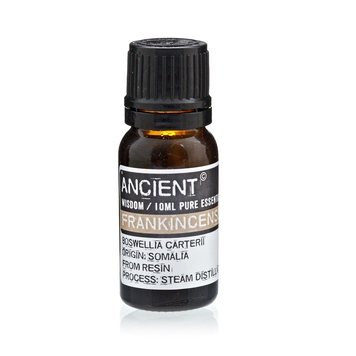 Bottle of frankincense essential oil with label on a white background