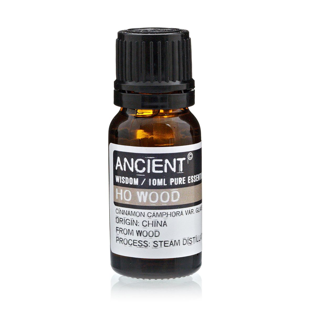 Bottle of Ho Wood essential oil with a black cap on a white background