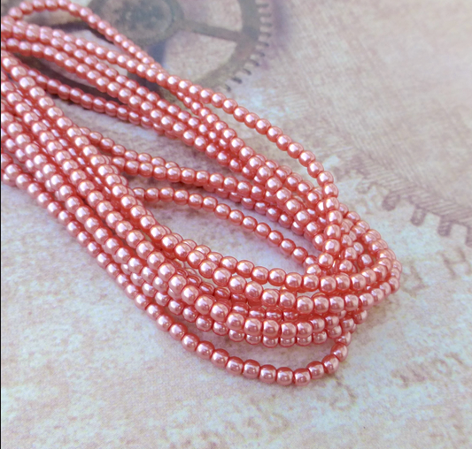 Salmon Round Czech Glass Pearls 2mm Strand of 150 beads