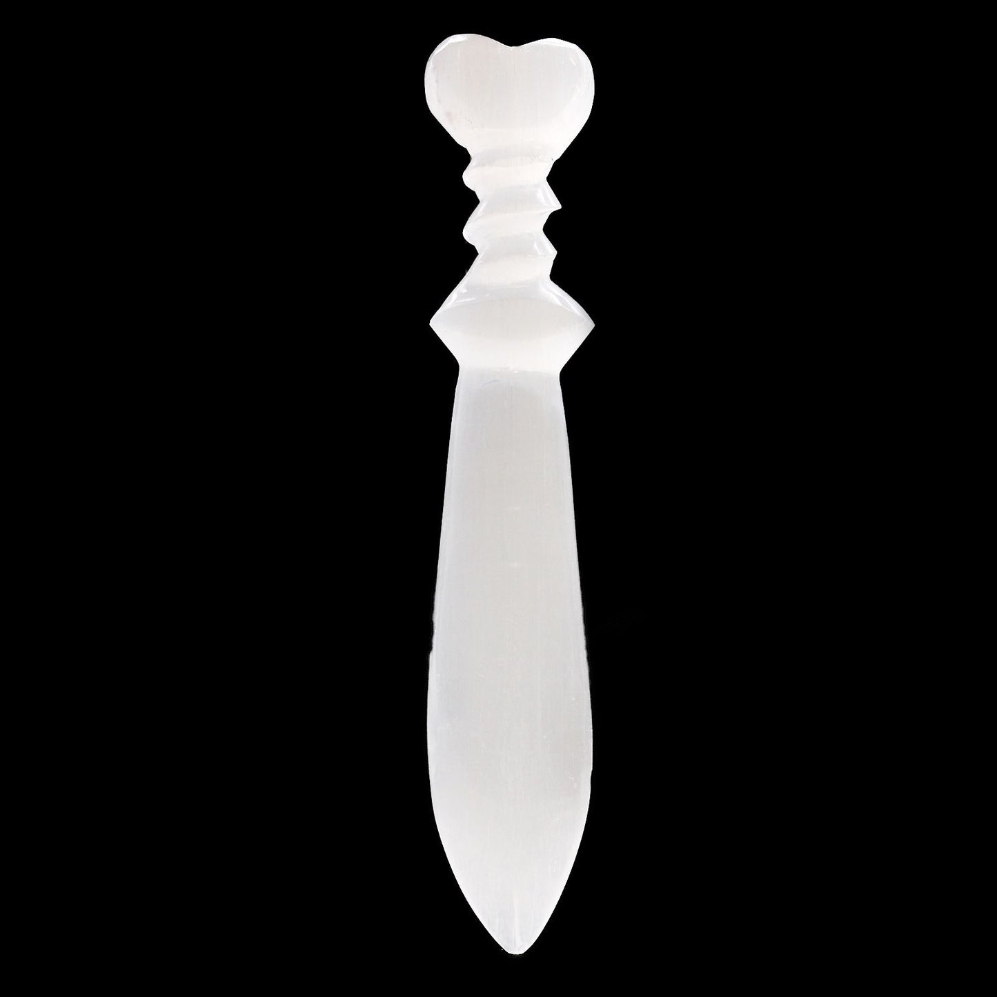 White decorative knife with a heart-shaped handle on a black background