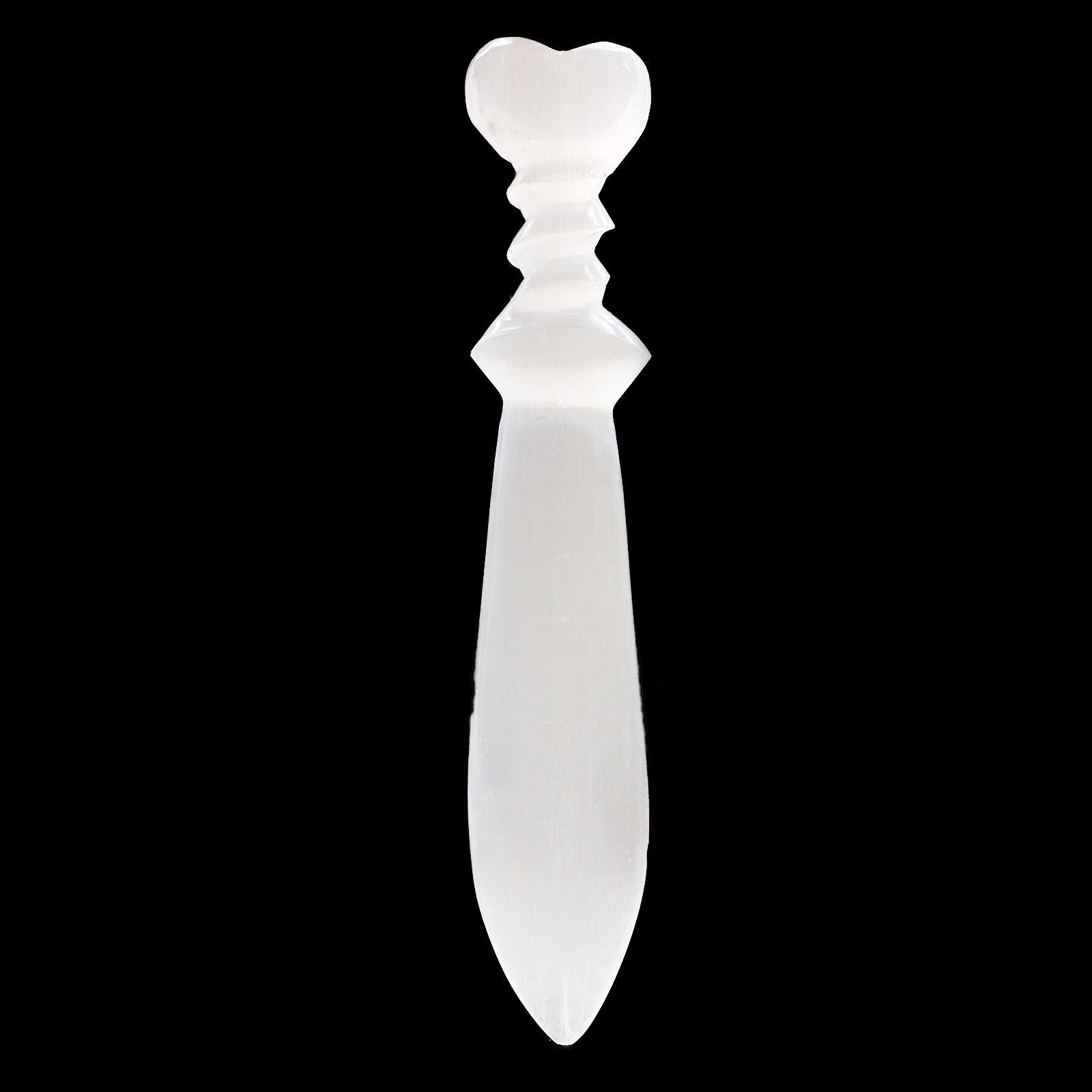 White decorative knife with a heart-shaped handle on a black background