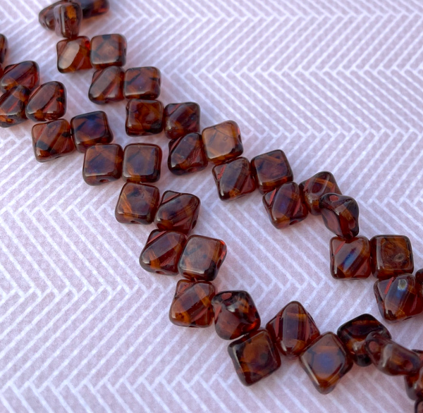 Topaz Picasso 2-Hole Silky Beads Strand of 40 beads