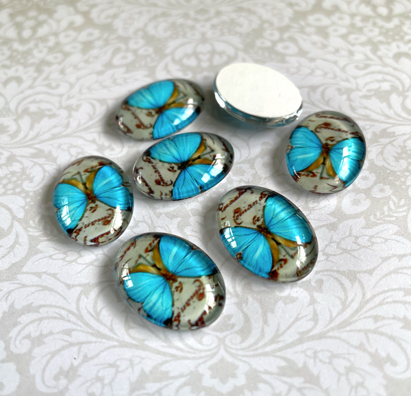 Blue Butterfly 18 x 13 mm Glass Oval Cabochons Pack of 10